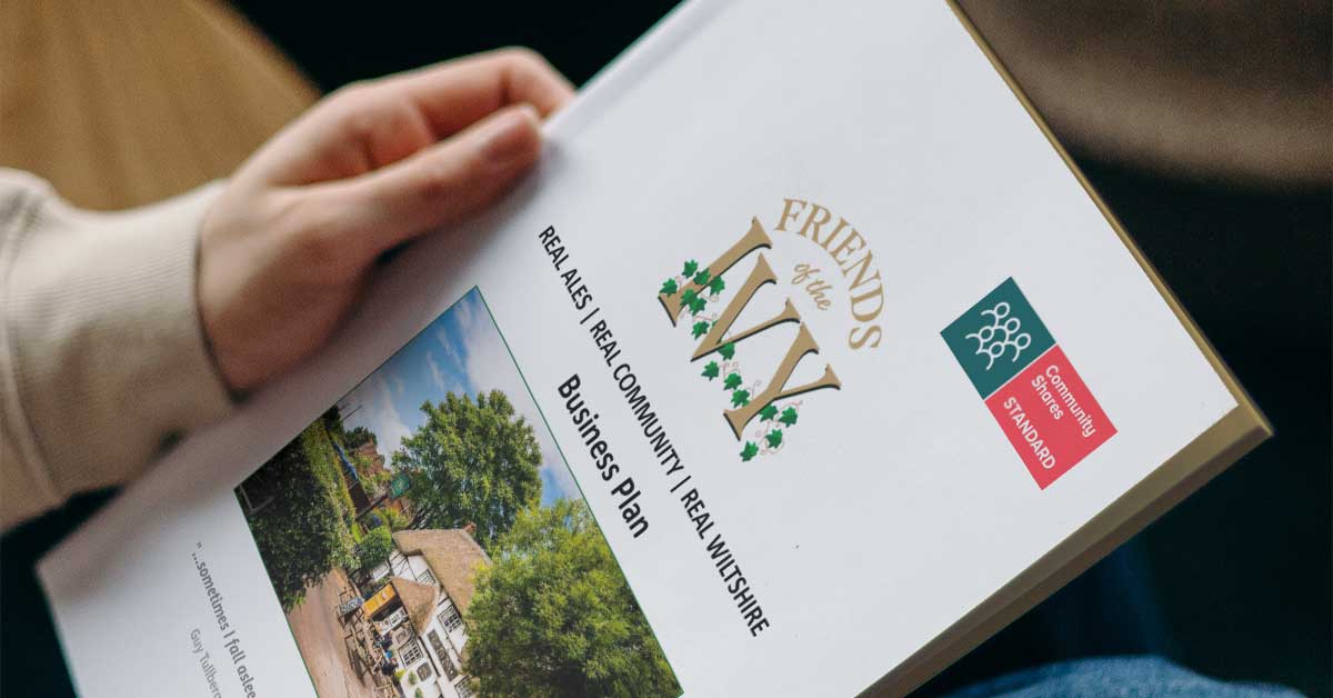 man reading Friends of The Ivy business plan