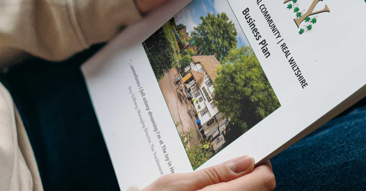 man reading Friends of The Ivy business plan